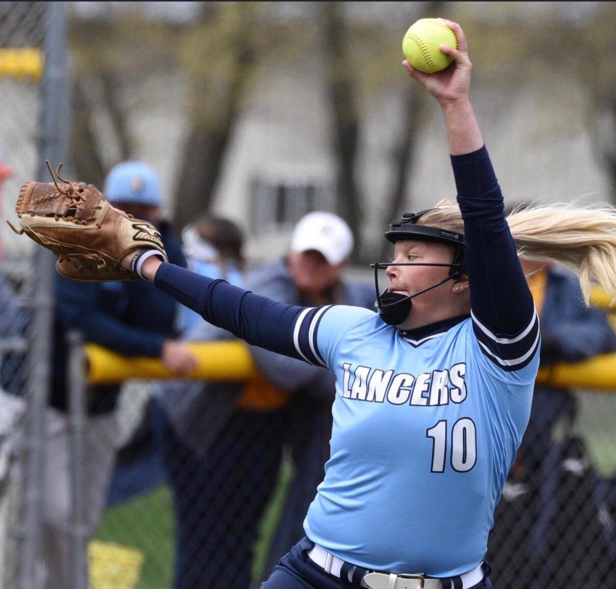 Close-up of Lancers pitcher #10 mid-windup