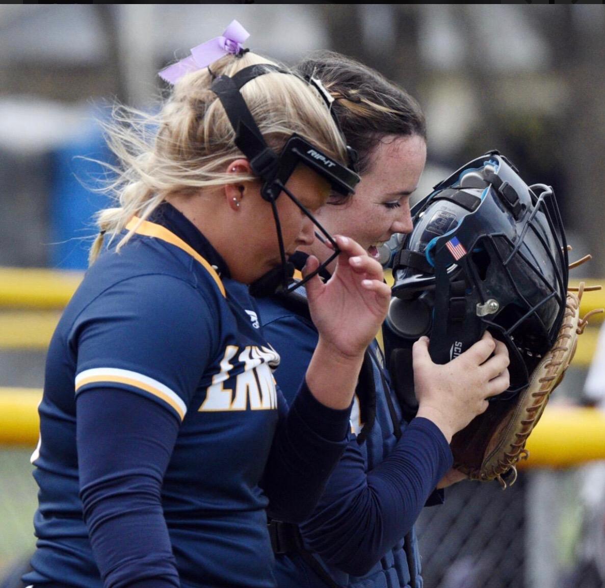 Pitcher and catcher conferring on the mound